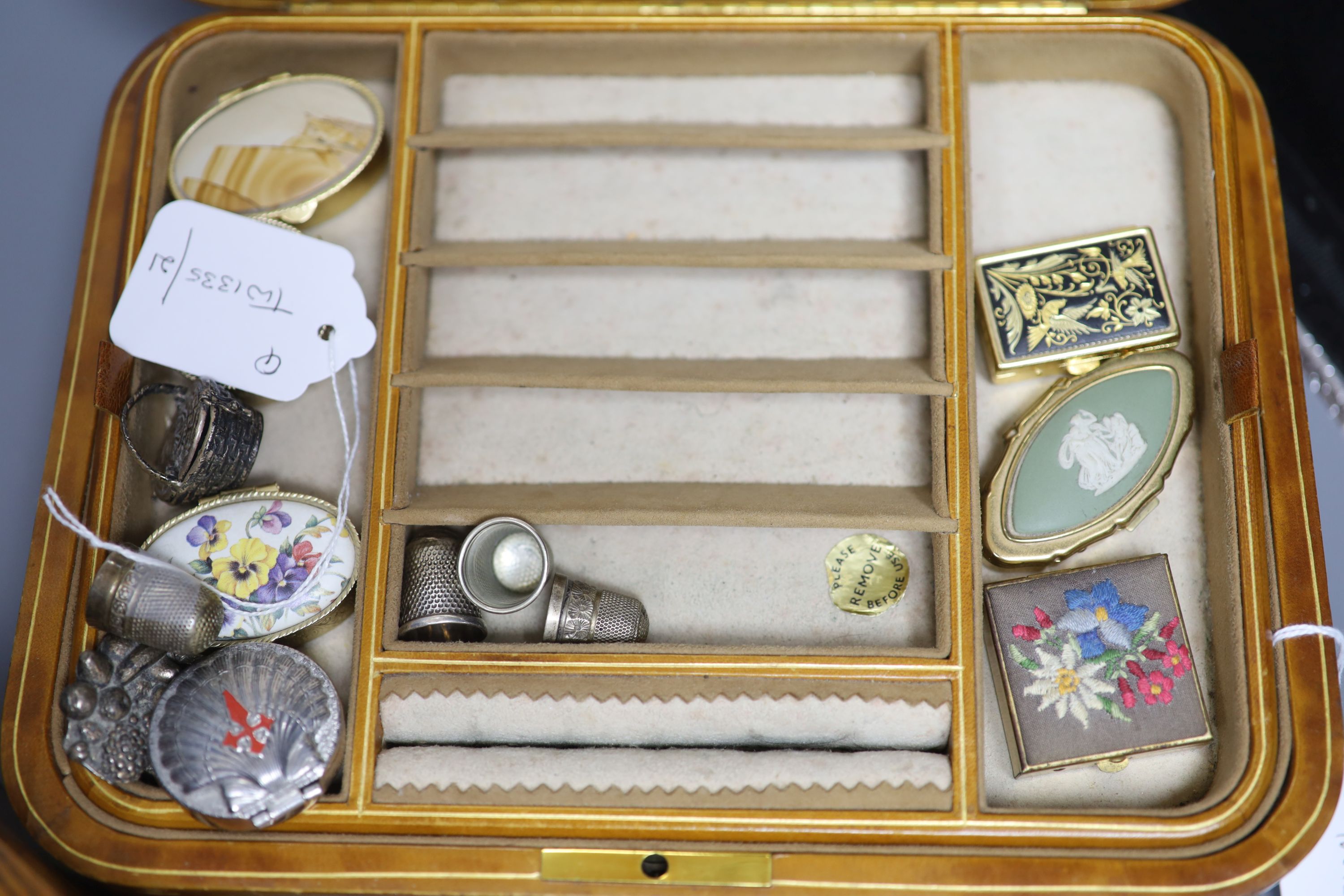 Various modern pill boxes, a pollard oak sewing box with contents, a leather jewellery case, a silver-mounted hand mirror, etc.